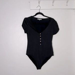 Gaze t-shirt bodysuit with lightly padded shoulders.